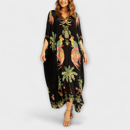 Linda - Eye-catching dress with off-the-shoulder design and coconut tree print